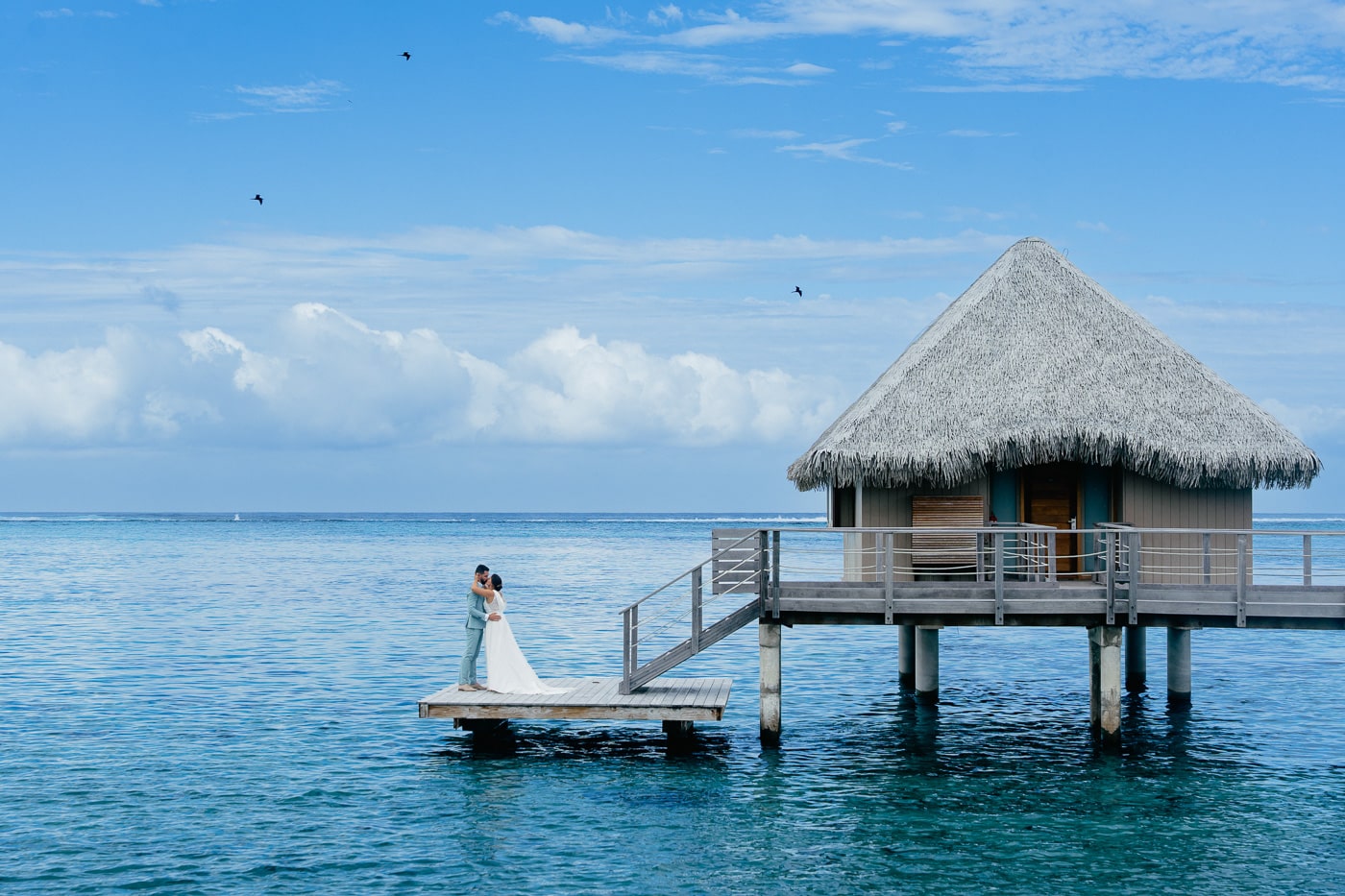 Romantic couple during a Tahiti honeymoon photoshoot Romantic couple during a Tahiti honeymoon photoshoot
